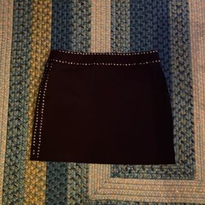 Black Express Skirt with sliver accents. Size 3/4.